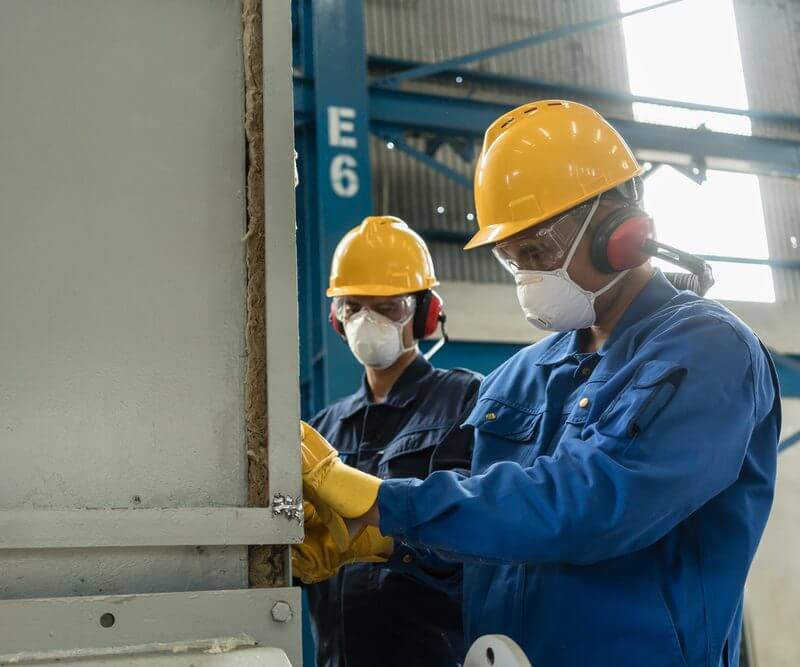 Factory workers in masks