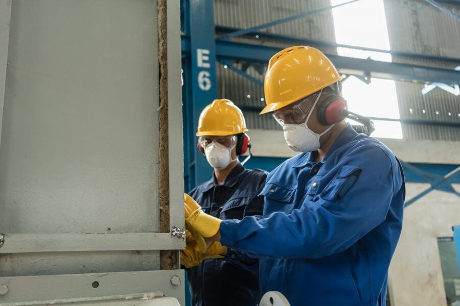 Factory workers in masks