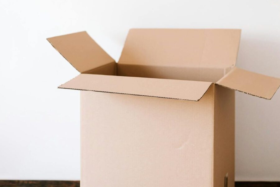 open cardboard box on a wood table