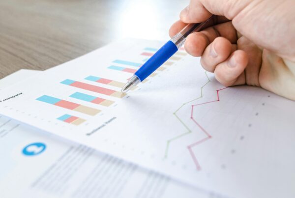 table with business charts and reports