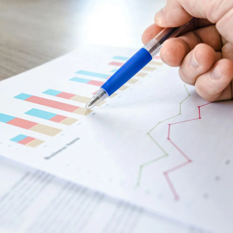 table with business charts and reports